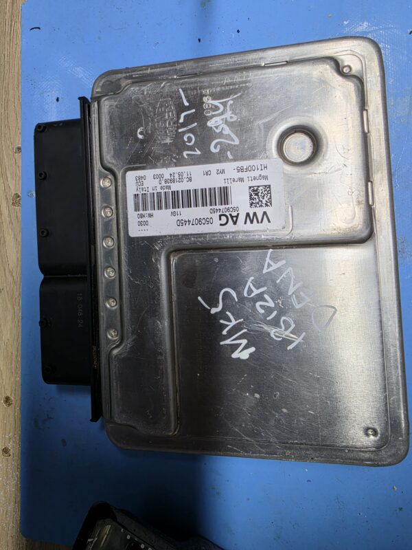 Magneti Marelli engine control module on a workbench