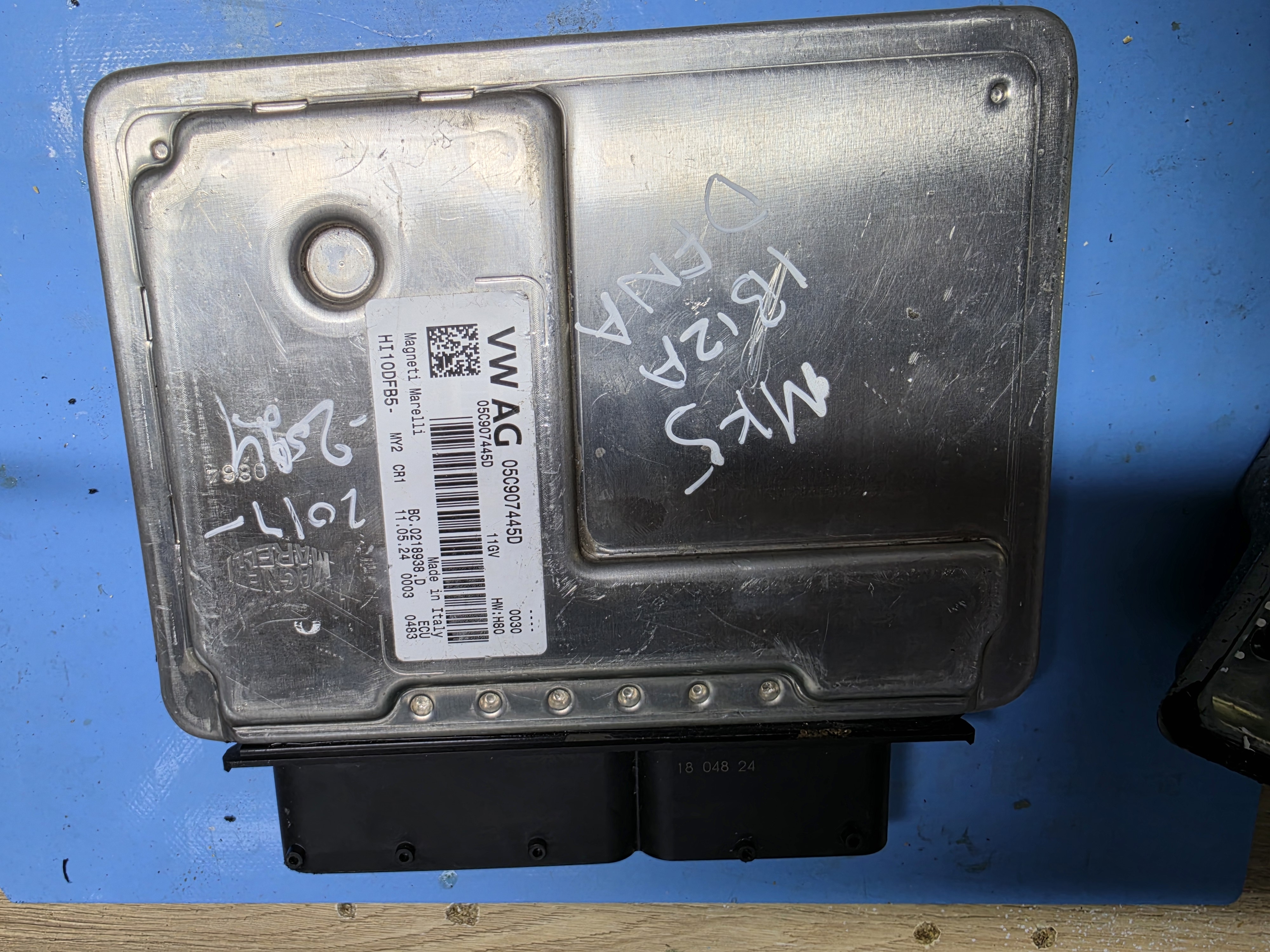 VW and SEAT Magneti Marelli 11GV ECU casing prepared for inspection and cloning